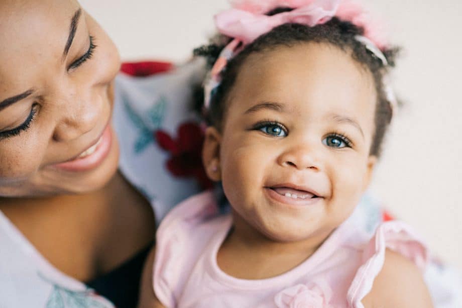 smiling mom and baby